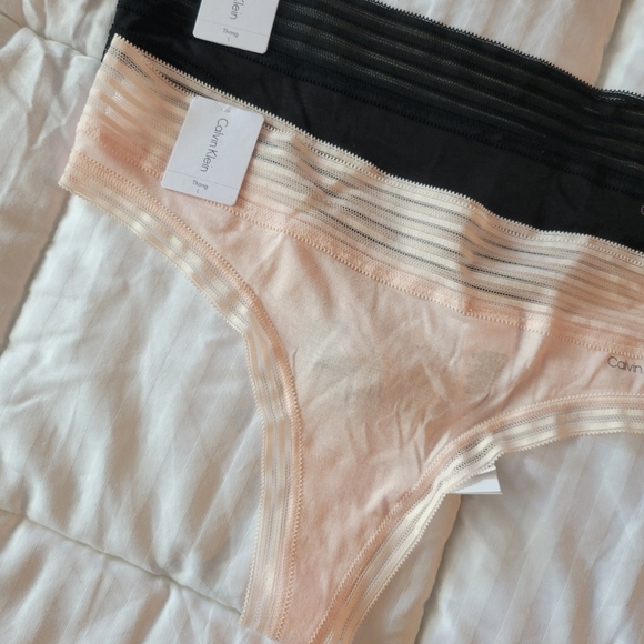 CALVIN KLEIN BRAND NEW SET OF TWO THONGS SIZE L - Picture 2 of 11